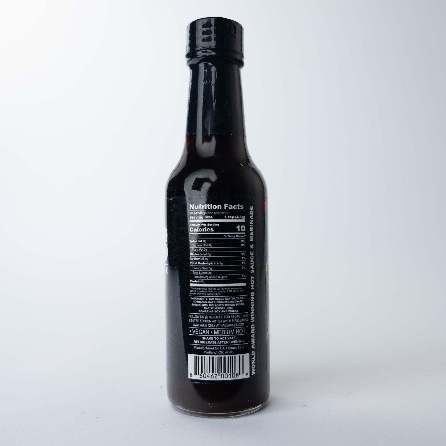 The back label of a HAB Sauce bottle showing ingredients and a barcode, set against a white background.